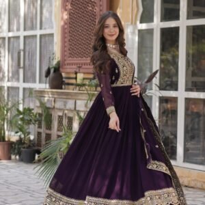 Women's Luxurious Plum Velvet Anarkali Gown with Heavy Gold Zari & Sequin Embroidery โ Perfect for Weddings & Grand Festivities